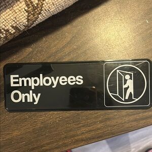 Black and White 'Employees Only' Sign